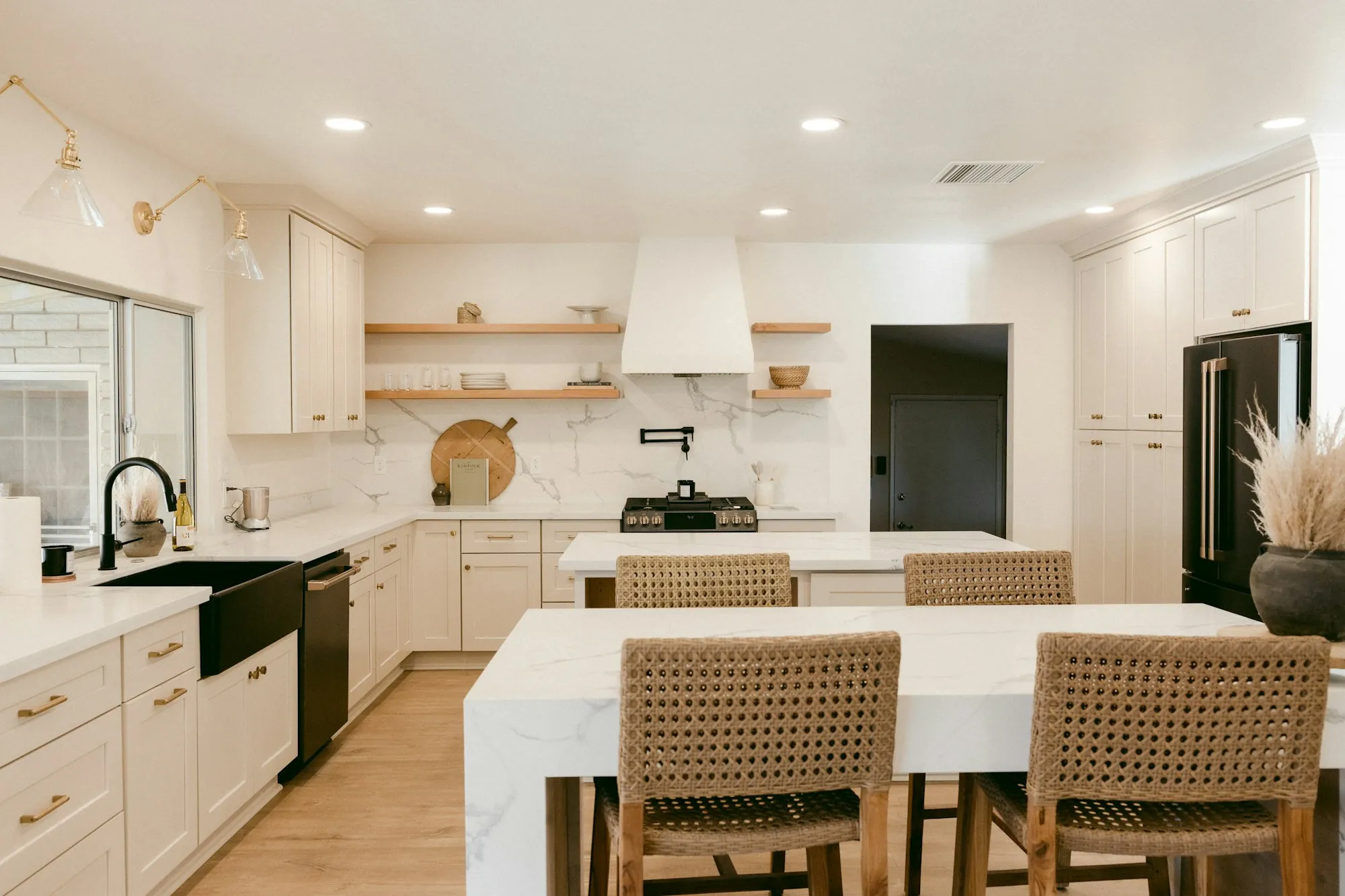 A kitchen with recessed ceiling lighting